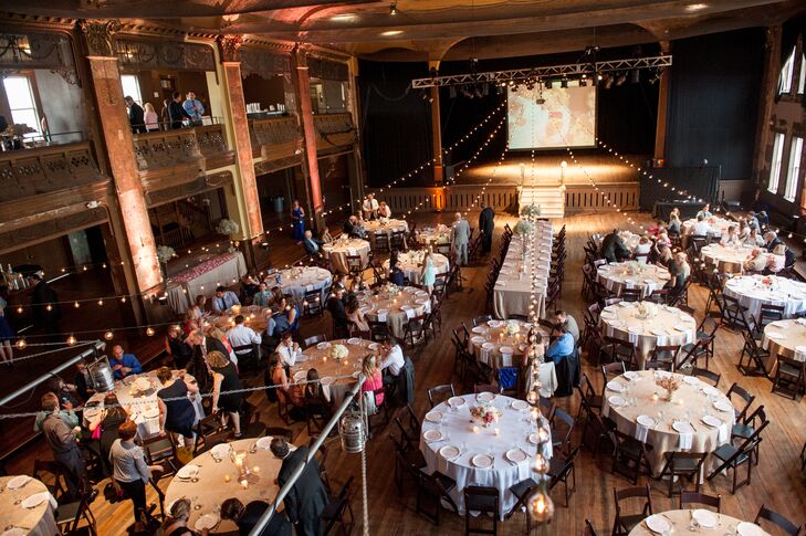 Amber and Andy's wedding reception at the Turner Ballroom featured romantic and rustic elements: The warm lighting and blush colors lent themselves to the former, while the wooden surroundings added to the latter.