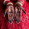 Vibrant Red Hues Set Apart This Wedding at Oheka Castle in Huntington, New York