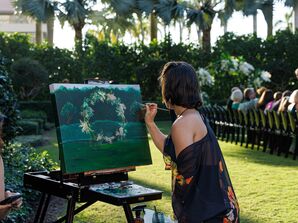 Live Painting of Circle Arch Wedding Ceremony Altar With Greenery and White Flowers