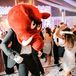 Bride in Mini Dress and Groom Wearing an Arkansas Razorback Mascot Big Red Head