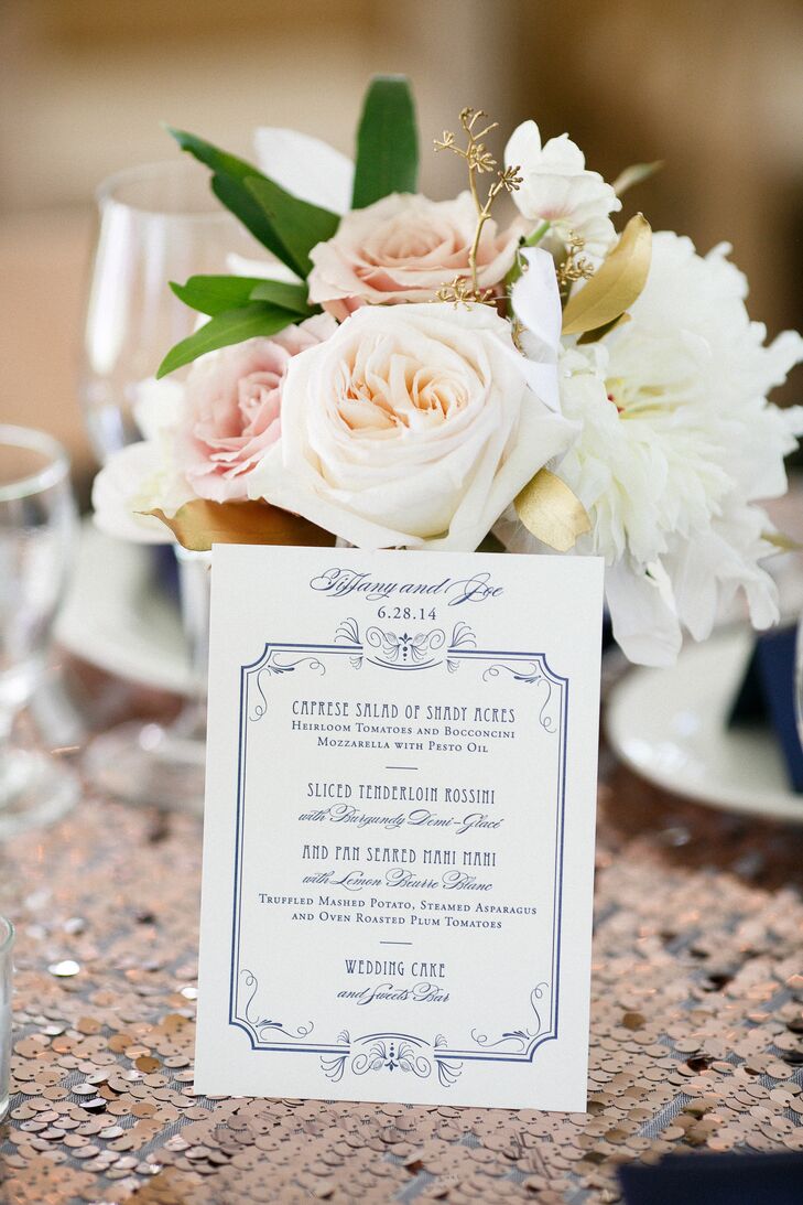Their menu cards captured the day’s color scheme with a hint of art deco style. Wrapped in a  geometric border and delicate details, each one featured a navy blue font on an all-white background. Magnificent Milestones created the custom design for all the stationery.
