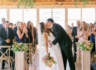 Haley and Armin tied the knot with a romantic apricot-hued wedding at Cordiano Winery in Escondido, California, near <a href="https://www.theknot.com/