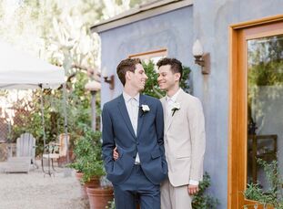 Calvin and Xavi were determined to say “I do” come rain or shine—literally. Once Hurricane Maria derailed the couple’s plans to marry in Xavi’s native