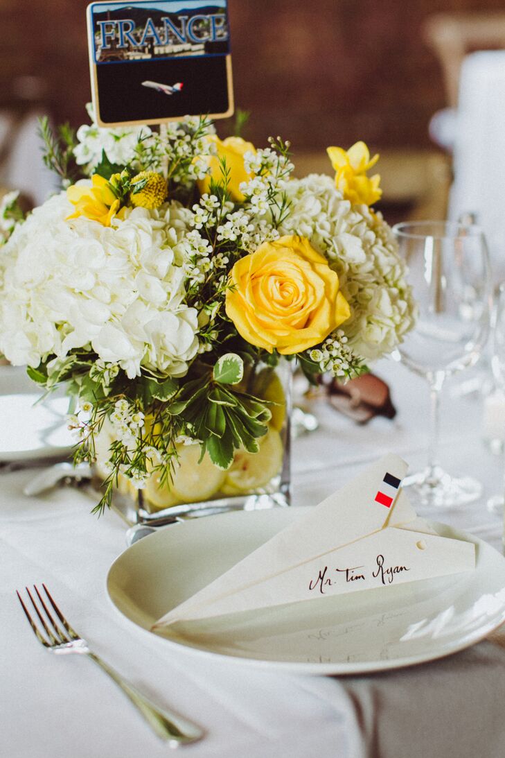 “Edouard was adamant about handwriting the escort cards and somehow incorporated recycled old wine list pages from his restaurant, Cafe Boulud,” Candice says. “After a lot of persuading, I finally gave in to the idea of escort paper airplanes.” The couple spent an entire Sunday folding planes, taping the bases and writing the guests’ names. “We managed to tie the planes into our day’s theme in a pretty crafty way. Instead of table numbers, we used country names of places we intend to visit or have visited together.”