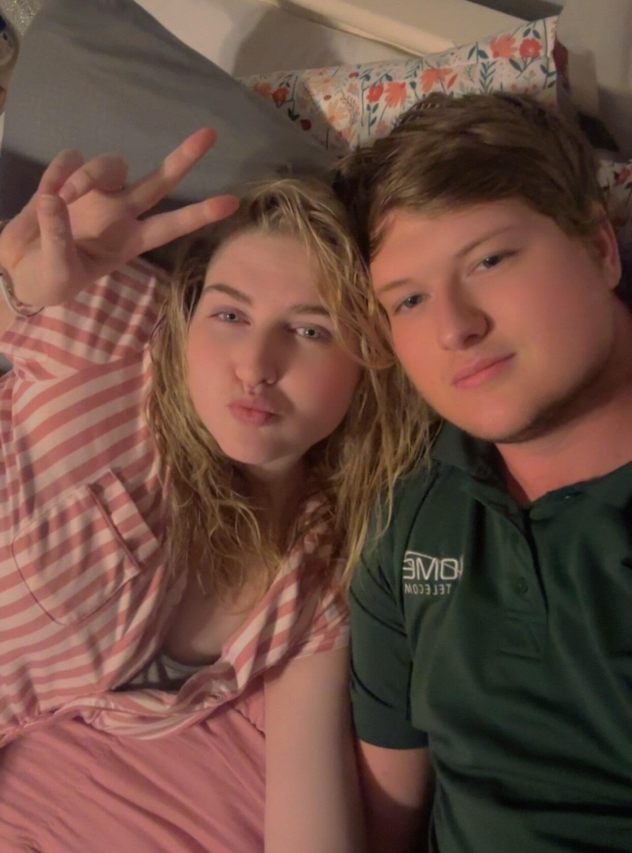 One of their favorite activities is laying in bed and watching movies. 