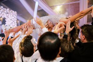Bride in a Mini Dress Crowd Surfs at Her Tented Wedding Reception