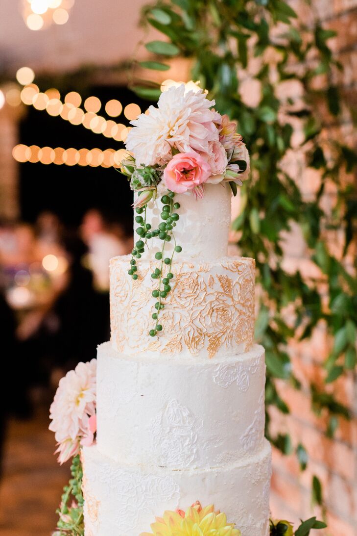 Edible Gold Garnished This Almond and Vanilla Tiered Cake with Flowers