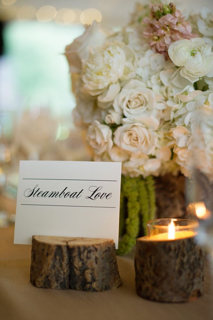 The tables were named after places Ashley and Kyle had been to or things they had done together. The Steamboat table, for example, was labeled with the word "Steamboat" and a picture of them in Steamboat on the other side.