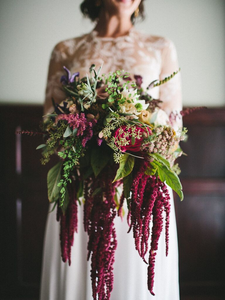 Cascading wedding bouquet at fairytale-themed wedding