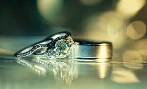 Three Stone Diamond Ring with Twisted Setting