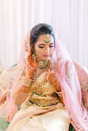 Bride in Pink-and-Gold Sari Wedding Dress With Pink Veil