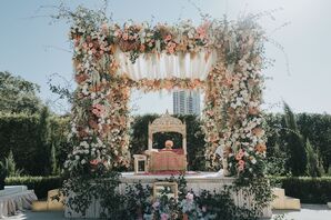 Floral Altar With Pink-and-White Flowers and The Guru Granth Sahib at Sikh Wedding