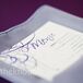 Soft gray napkins contrasted with the table linens, while the menu cards featured the same artsy design as the invitations and cake.