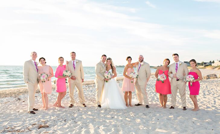 To ensure their wedding party's attire reflected the wedding's beachy vibe, the couple opted for khaki linen suits and playful pink dresses.