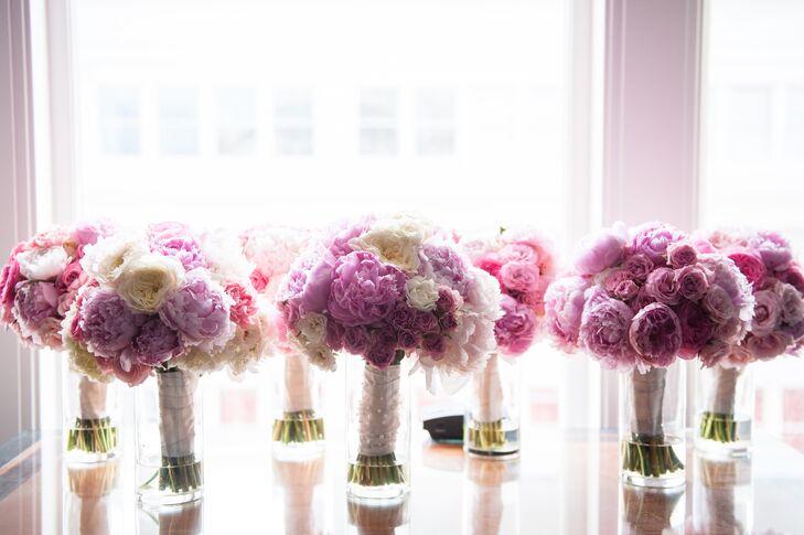 The pink and white bridesmaid bouquets (filled with roses and hydrangeas) had a double purpose -- hand-held ceremony bouquets and head table centerpieces at the reception.