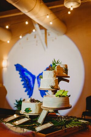 Modern Wedding Cake Display with Tropical Leaves