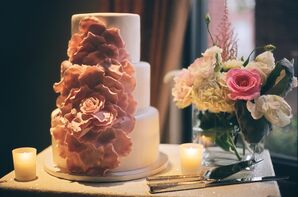 Pink Sugar Flowers on Three Tier White Cake