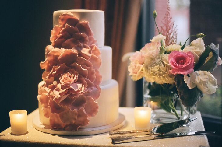 Pink Sugar Flowers on Three Tier White Cake