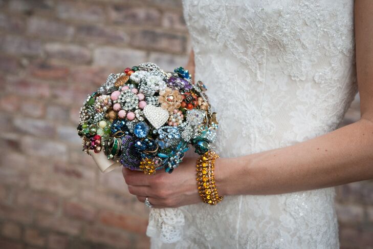 "I collect vintage jewelry, so my mom and I went to an antique expo and chose some beautiful vintage rhinestone pieces for all my looks," Laura says. "I wore brooches as hair pieces and also had all my vintage brooches made into a multicolored brooch bouquet."