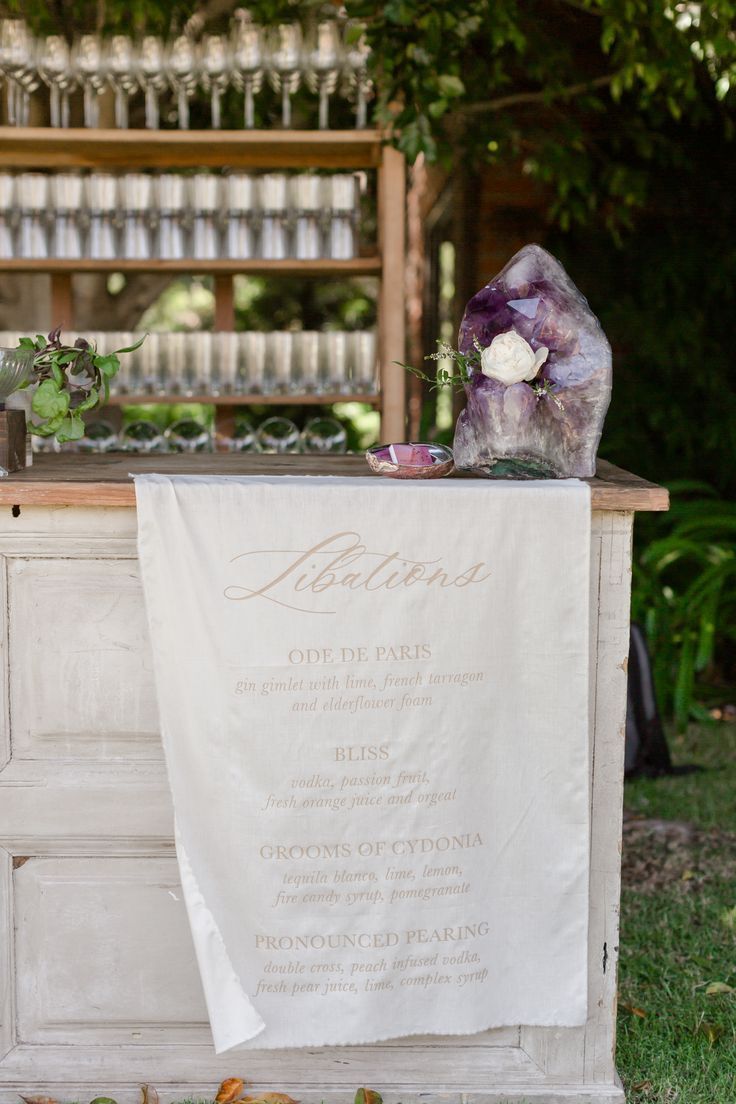 Elegant linen sign hanging from bar front
