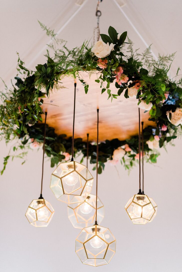 Globe Lights and Hanging Floral Arrangements Added to the Horticultural-Themed Wedding Celebration