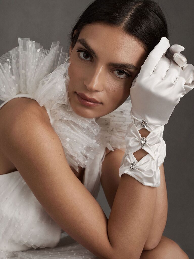 Nana Jacqueline white wedding gloves adorned with glittering rhinestones