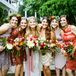 Each of Gina’s bridesmaids stood out with a different look. Based on a muted berry and rust-inspired color scheme, they sported knee-length lace, beaded and sheer dresses. The women also chose their own hairstyles and neutral shoes. Gina simply tied their looks together with lush garden-style bouquets from Belovely Floral and Event Design and two flower crowns. Each arrangement had a series of pink garden roses, greenery, eucalyptus and orange poppies.