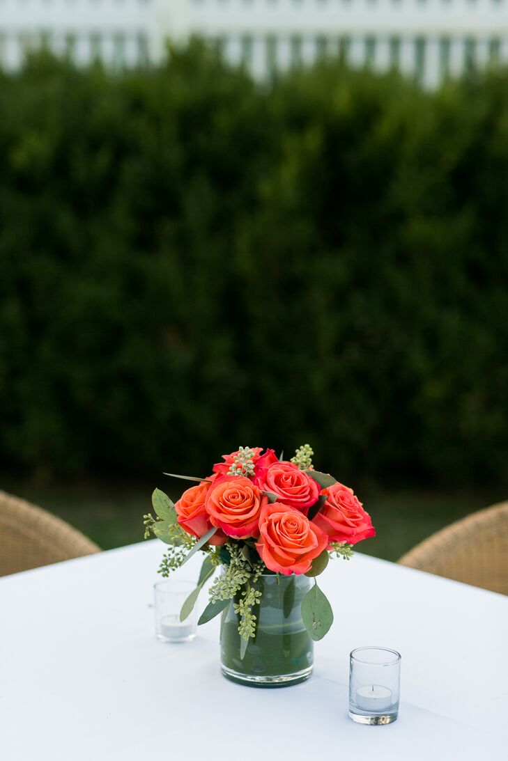 Simple Coral Rose Centerpiece With Seeded Eucalyptus
