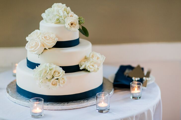 Navy and White Tiered Cake With White Roses