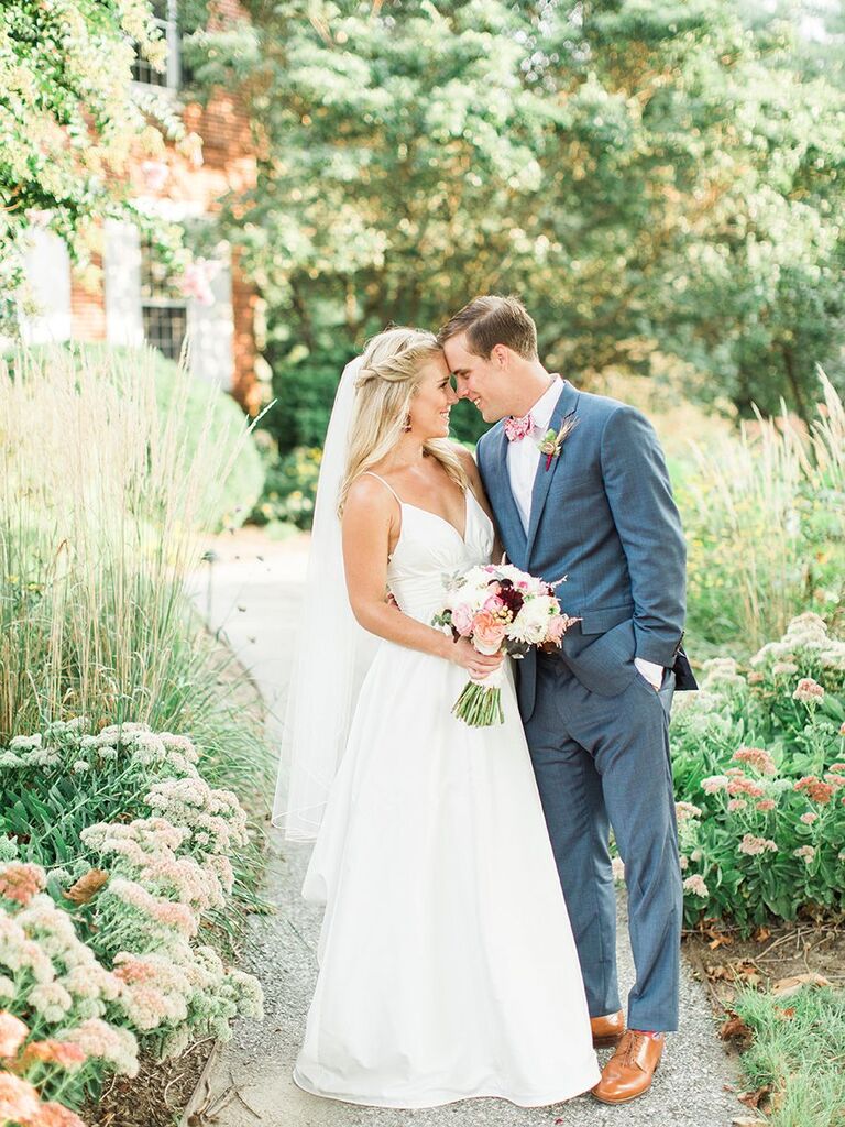 bride and groom in garden