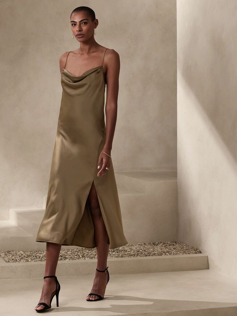 simple spring wedding guest dress in dark green