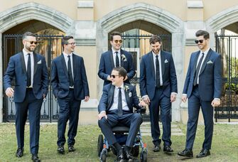 groom and groomsmen in navy suits