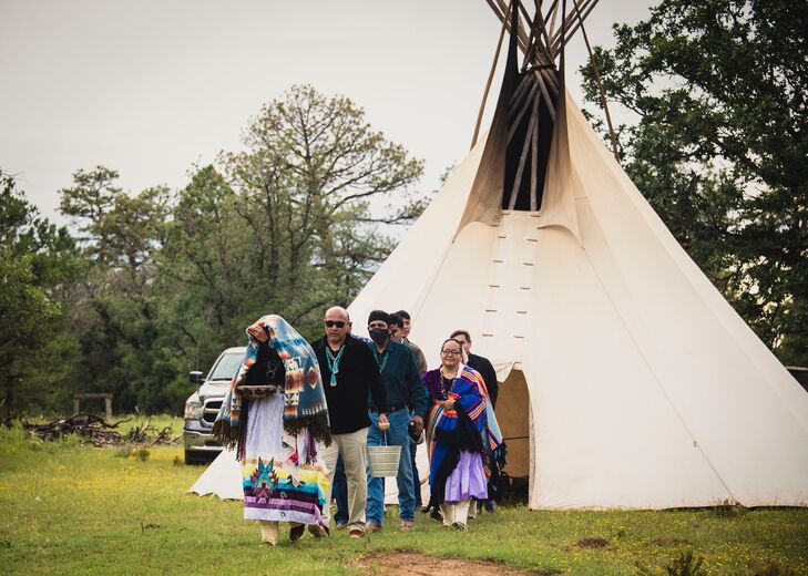 Bride Under Blanket for Navajo Wedding Processional From Teepee