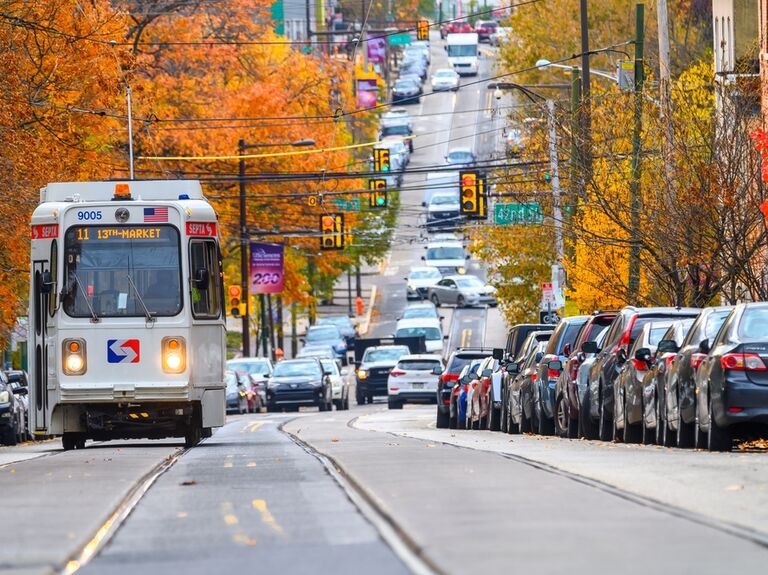 Trolley and cars on Philadelphia street for bachelorette party transportation