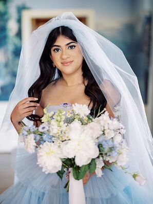 Bride With Loose Curls Wearing Wedding Veil