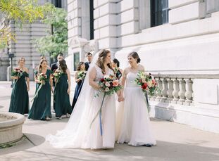 For their fall wedding at The Madison in Cleveland, Ohio, Trisha and Alex embraced a jewel-tone color palette comprised of rich shades of emerald, rub
