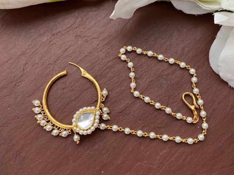 Nose ring with pearl and crystal embellishments. 