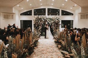 Modern, Romantic Indoor Ceremony with Flower Arch, Pampas Grass and Rose Petals