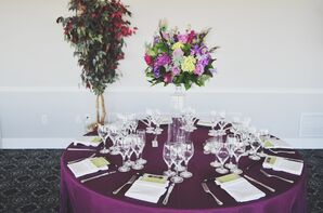 Purple Tables with High Centerpieces