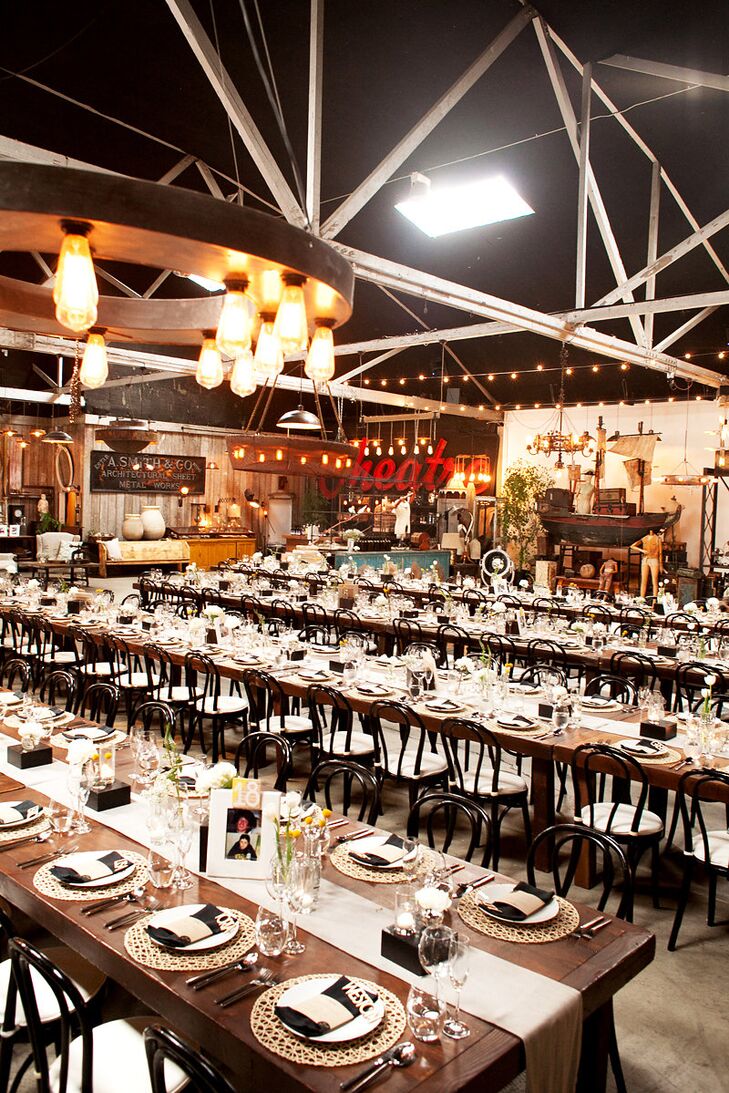 With its eclectic decor and subtle industrial feel, Big Daddy’s Antiques in Los Angeles offered the ultimate backdrop for Danielle and David’s ultra-personalized affair. Details like wooden farm tables, simple white linens and bud vases filled with sunny yellow crapedias played into the venue’s rustic vibe, while peonies displayed atop black pedestals and laser cut accents brought a note of modernity to the decor.