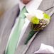 Gray Groom Suit with Green Tie and Boutonniere