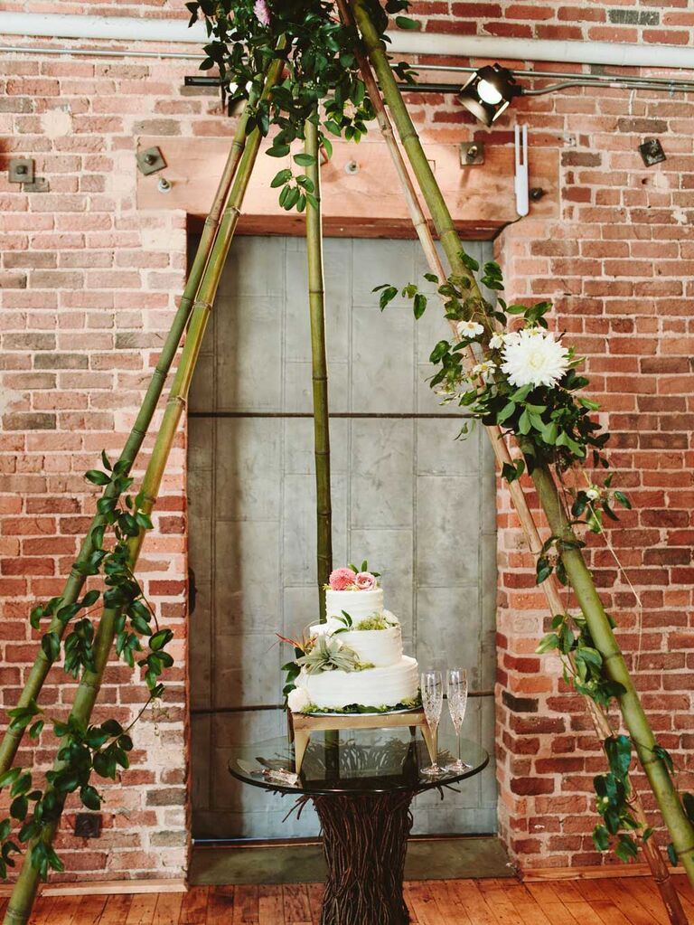 Small three-tier wedding cake with flowers