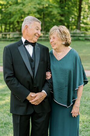 Grandparents in Black Tie Attire, a Teal Gown and a Classic-and-Formal Black Tuxedo