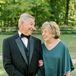 Grandparents in Black Tie Attire, a Teal Gown and a Classic-and-Formal Black Tuxedo