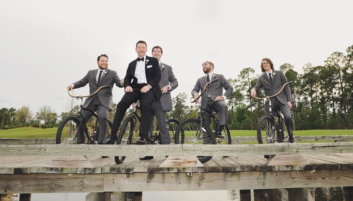 Jarrett wore a traditional, slim-fit tuxedo with a bow tie, while his groomsmen wore slim-fit, black suits with skinny ties.