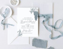 Blue gray grapes and leaf illustrations and elegant type on white background