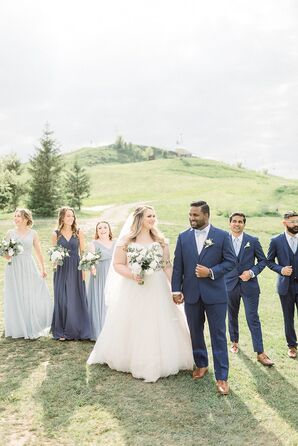Couple With Wedding Party in Shades of Blue