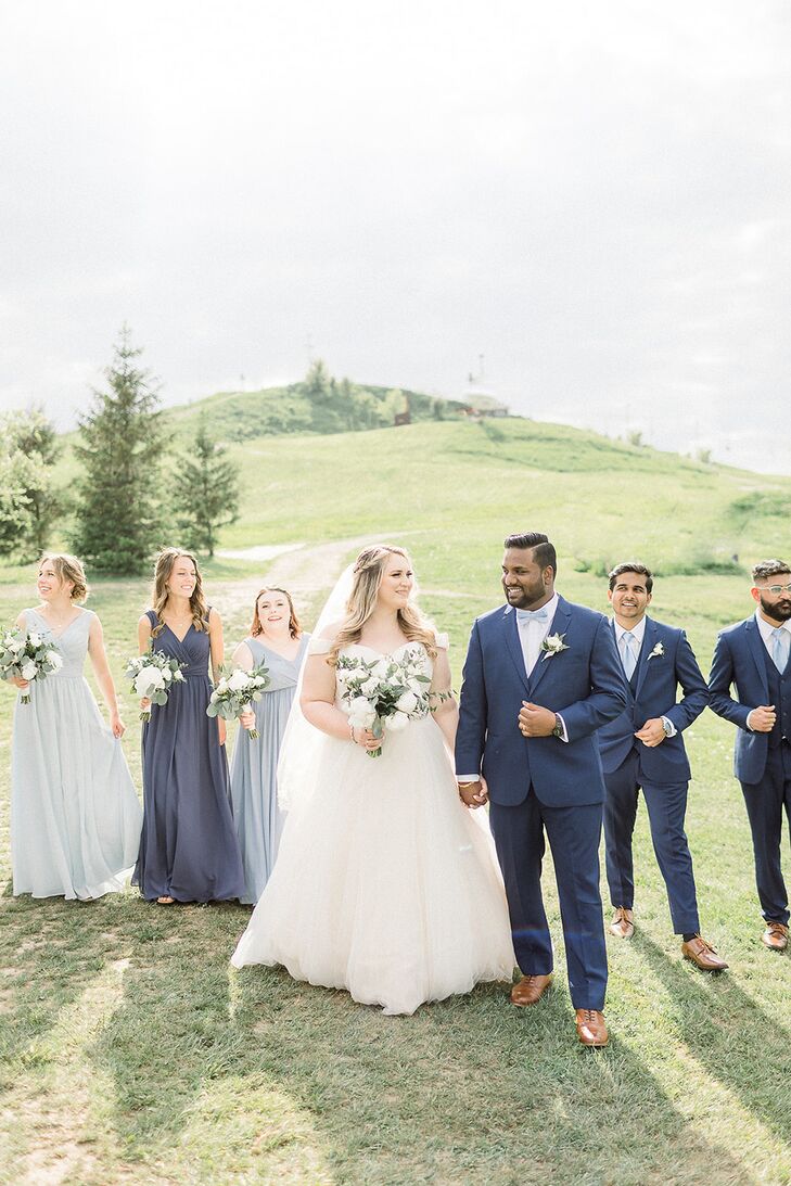 For their wedding at Lodge at the Rock in Milwaukee, Wisconsin, Taylor and Ahbi filled their celebration with a variety of serene blue shades that bef