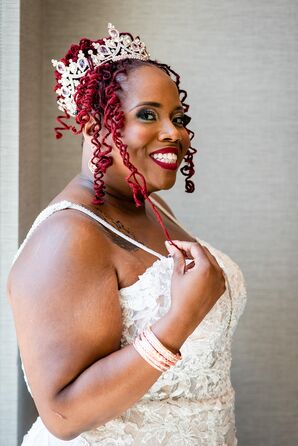 Bride With Red Locs, Crystal Crown and Colorful Makeup Smiling in Wedding Dress