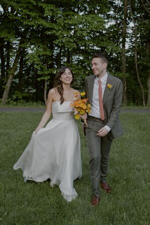 Bride in Strapless Gown and Braid, Groom in Gray Suit and Colorful Bouquet